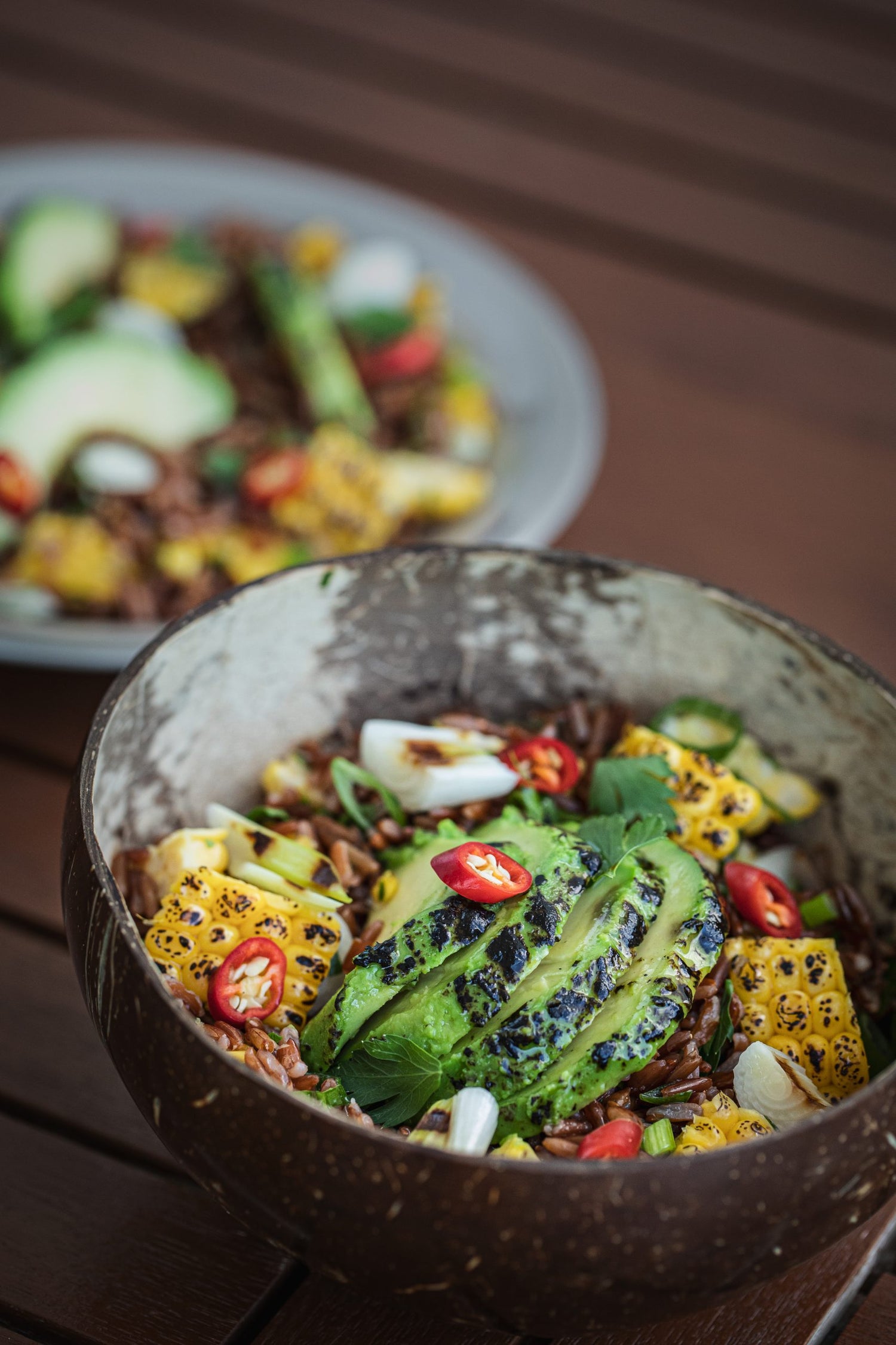 RED RICE SALAD WITH CHARGRILLED CORN, AVOCADO, CHILLI, LIME AND SPRING ONIONS 