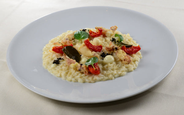 Riso Gallo Gran Riserva, calamari spillo croccanti, aglio gentile e datterini confit